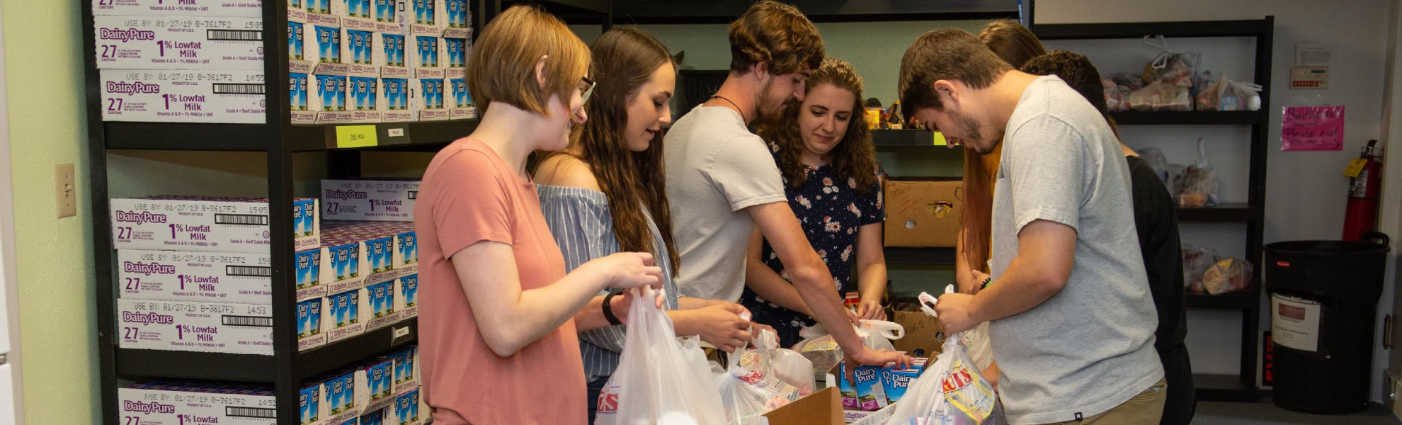 students_fill_backpacks